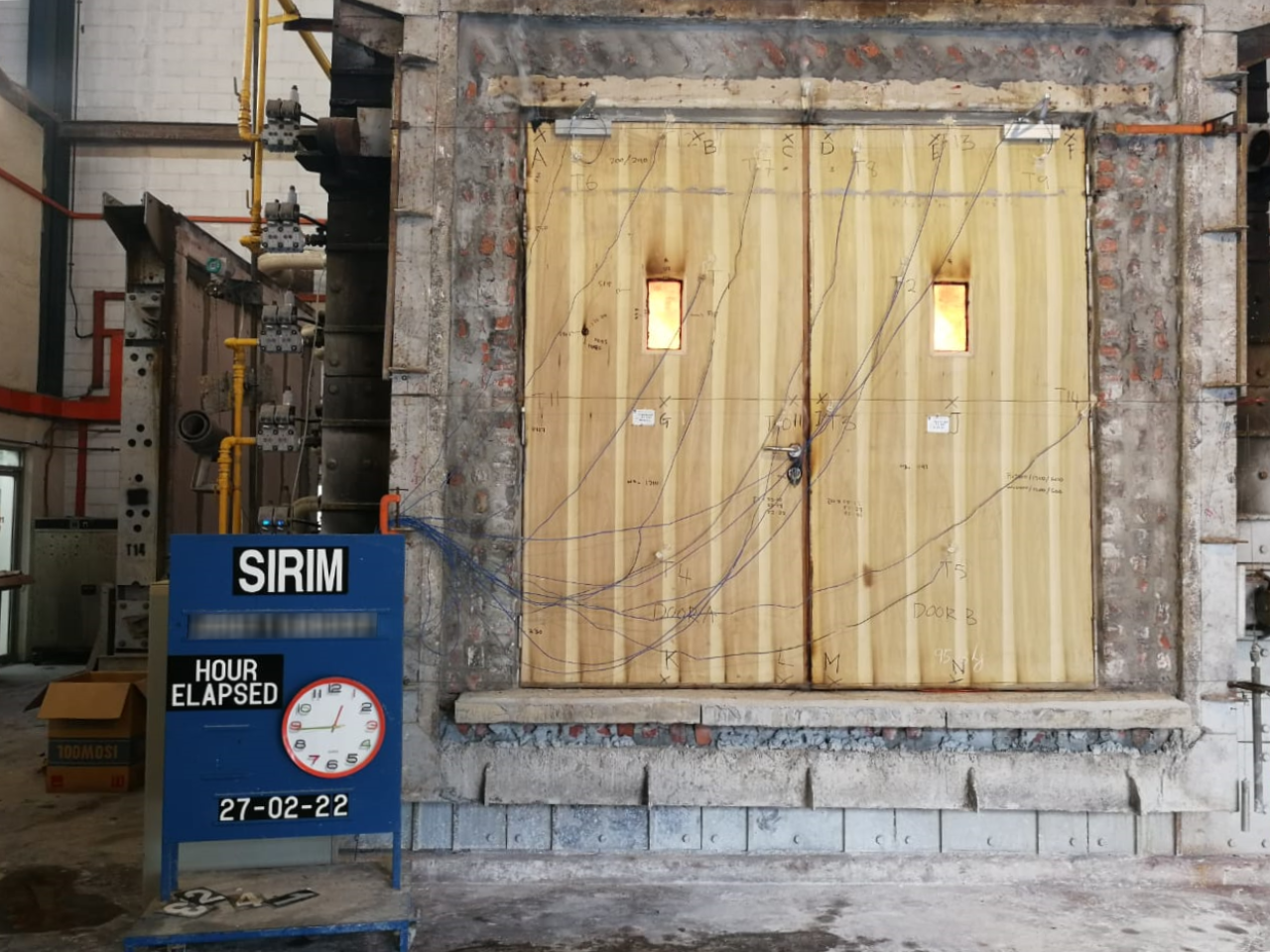 Fire door being tested by the Leading Fire Rated Door Manufacturers In Malaysia